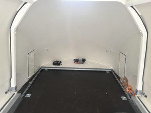 inside of a white enclosed vehicle trailer