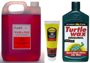 clear container of red vehicle wax next to a small yellow tube of polish and a green tube of turtle wax
