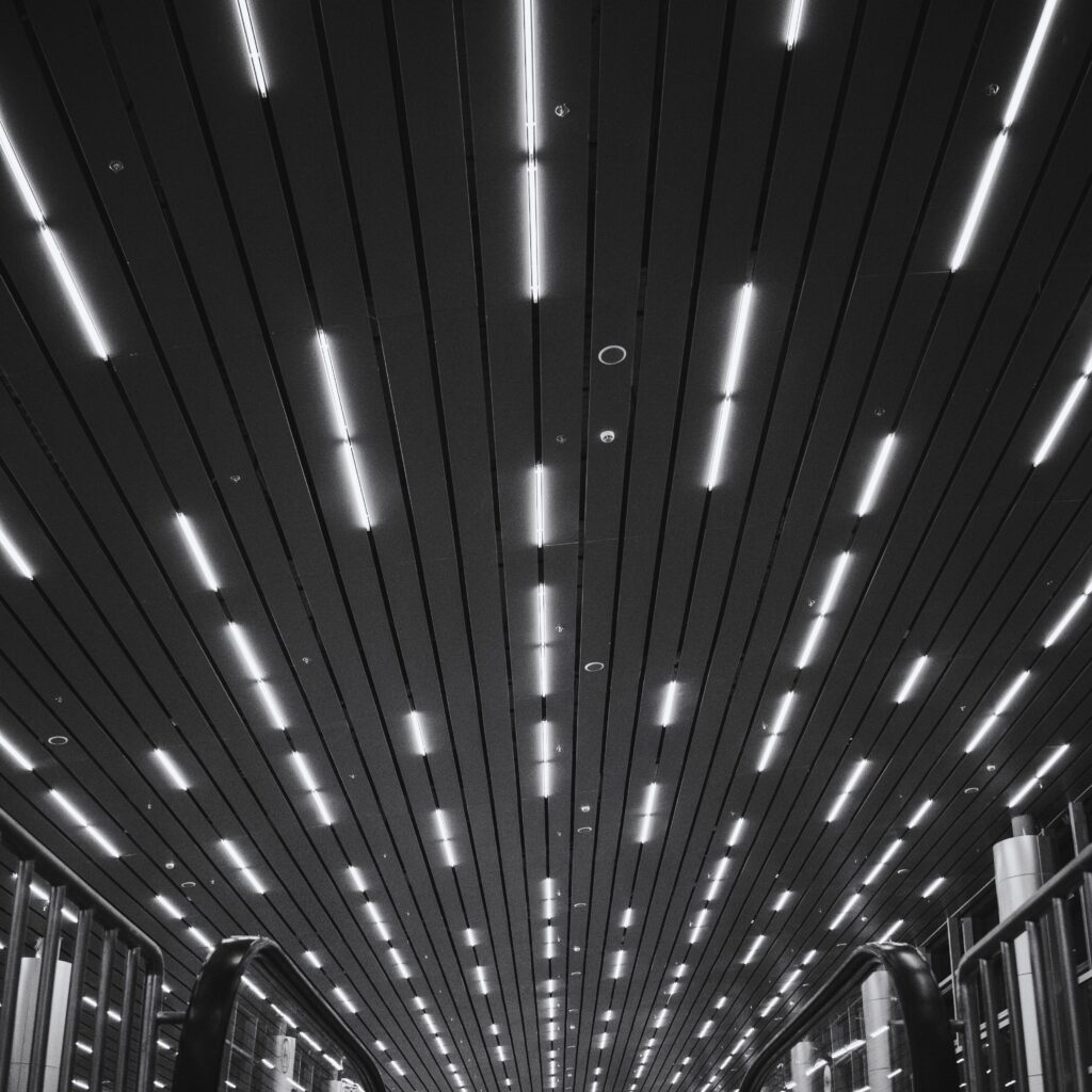 Black and white image on led lights on a roof